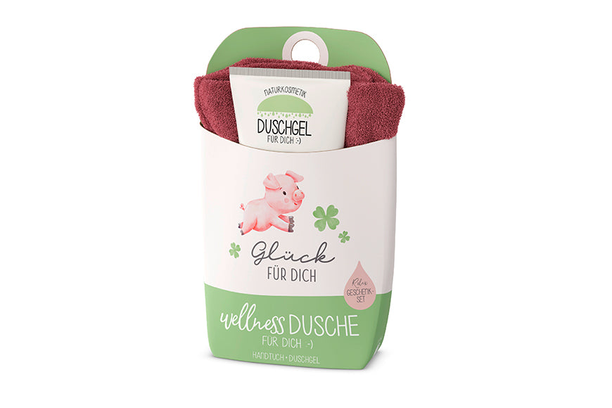 Wellnessdusche Glück für Dich mit Handtuch & Duschgel. Vegan & zertifiziert. Mit Glücksschwein & Kleeblättern – liebevolle Geschenkidee.