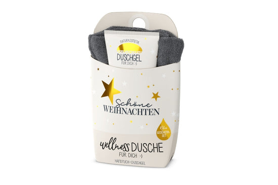 Wellnessdusche „Schöne Weihnachten“ – Handtuch &amp; Naturkosmetik-Duschgel in weißer Verpackung mit goldenen Sternen