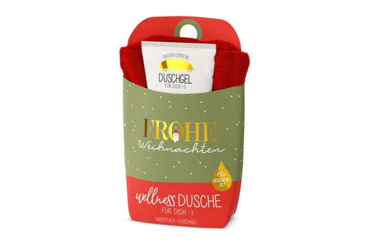 Wellnessdusche „Frohe Weihnachten“ – Handtuch &amp; Naturkosmetik-Duschgel in grüner Verpackung mit Santa-Motiv