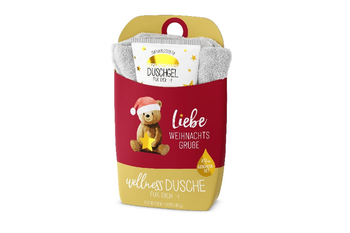 Geschenkset Wellnessdusche mit Naturkosmetik Duschgel & Bio-Baumwoll-Handtuch. Aufschrift „Liebe Weihnachtsgrüße“ von Geschenk für Dich.