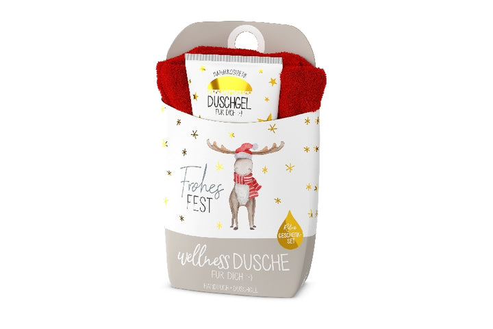 Geschenkset Wellnessdusche mit Naturkosmetik Duschgel (200ml) & Bio-Baumwoll-Handtuch. Weihnachts-Elch-Motiv & Aufschrift „Frohes Fest“ von Geschenk für Dich.