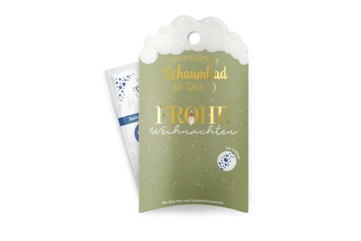 Naturkosmetik-Schaumbad „Frohe Weihnachten“ in grüner Verpackung mit Wichtel-Motiv