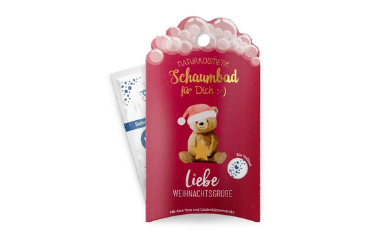 Geschenk für Dich Naturkosmetik Schaumbad mit Weihnachts-Bär Motiv & Aufschrift „Liebe Weihnachtsgrüße“.