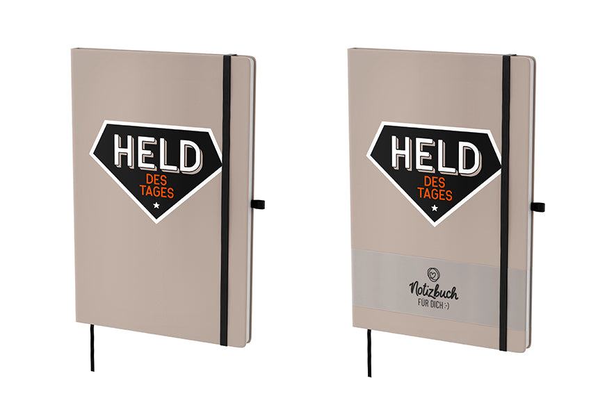 Beiges Hardcover-Notizbuch „Held des Tages“ mit 96 linierten Seiten, Lesezeichen & Stiftehalter von Geschenk für Dich