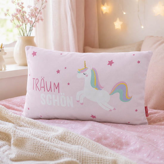 Kinderkissen Einhorn Träum schön mit Regenbogenmähne und Sternen, pinke Rückseite