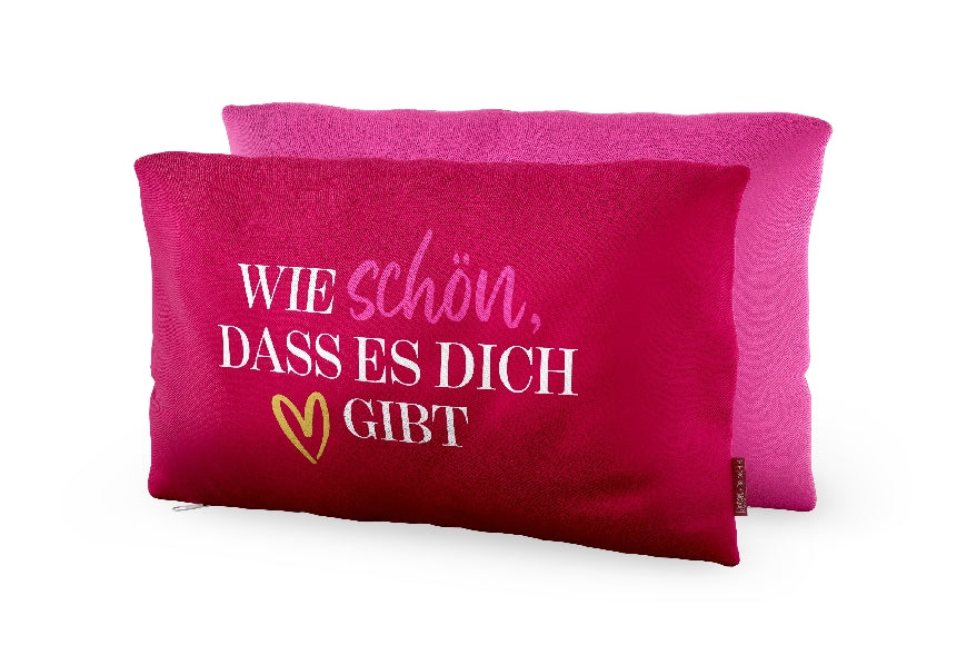 Pinkes Kissen mit Aufschrift „Wie schön, dass es Dich gibt“ von Geschenk für Dich. 