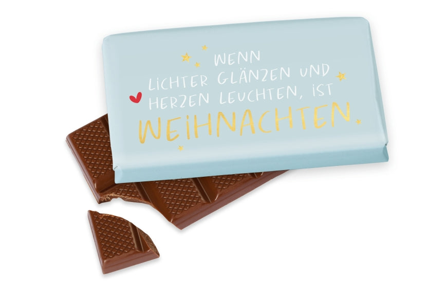 Weihnachtsschokolade mit Spruch Wenn Lichter glänzen und Herzen leuchten ist Weihnachten, hellblau mit Herz und Sternen, Vollmilch 40 g – Geschenk für Dich