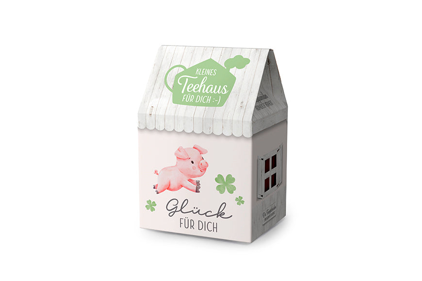 Kleines Teehaus mit Aufschrift „Glück für Dich“ Motiv Glücksschwein und Kleeblätter von Geschenk für Dich. 8 Teepyramiden Früchtetee 
